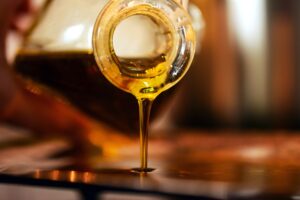 bottle pouring olive oil